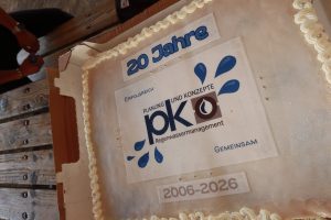 Jubiläumskuchen mit PK-Logo, dem Schriftzug 20 Jahre und den Jahreszahlen 2006–2026